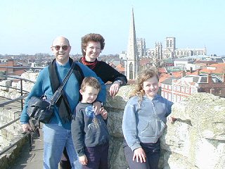 Family on ramparts of Cliffords Tower with York Minster in the background
