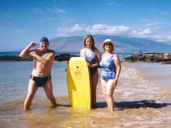 Grandparents and Granddaughter on the beach