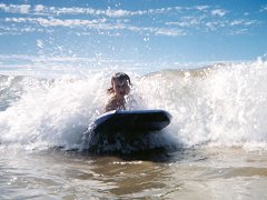 Henry manages to catch his wave