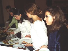Girls Queueing for food 240x180.jpg (12308 bytes)