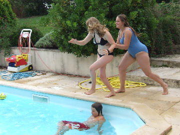 Alice pushes Eloise into the pool