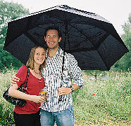 Oli and Amy with the double-strength sports umbrella