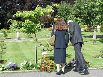 Inspecting the flowers at the Garden of Remembrance