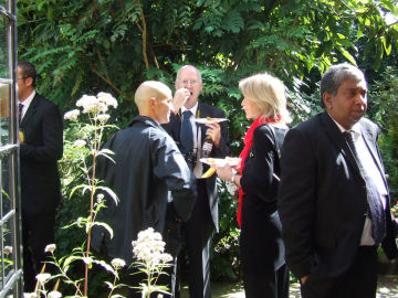 Gathering in the gardens of Corpus Christi
