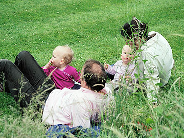 The Reed family relax on the lawn