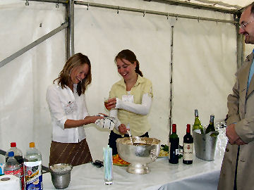 Ellie Hasketh and Amy Morris-Drake preparing the Pimms