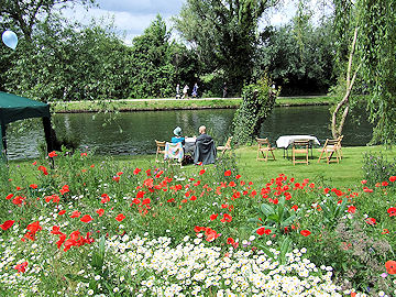 The Martins  contemplate the river