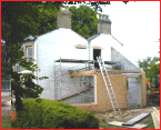 Walls built and upper doors knocked through...